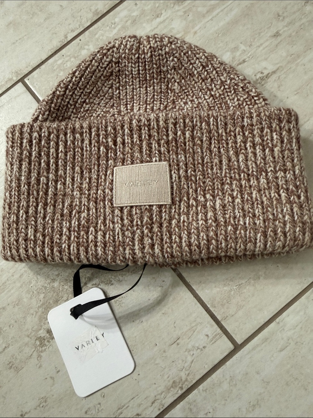 Varley ladies  Marled Beige Knit Beanie nwt ..
O/S .. tweed ..name logo tag